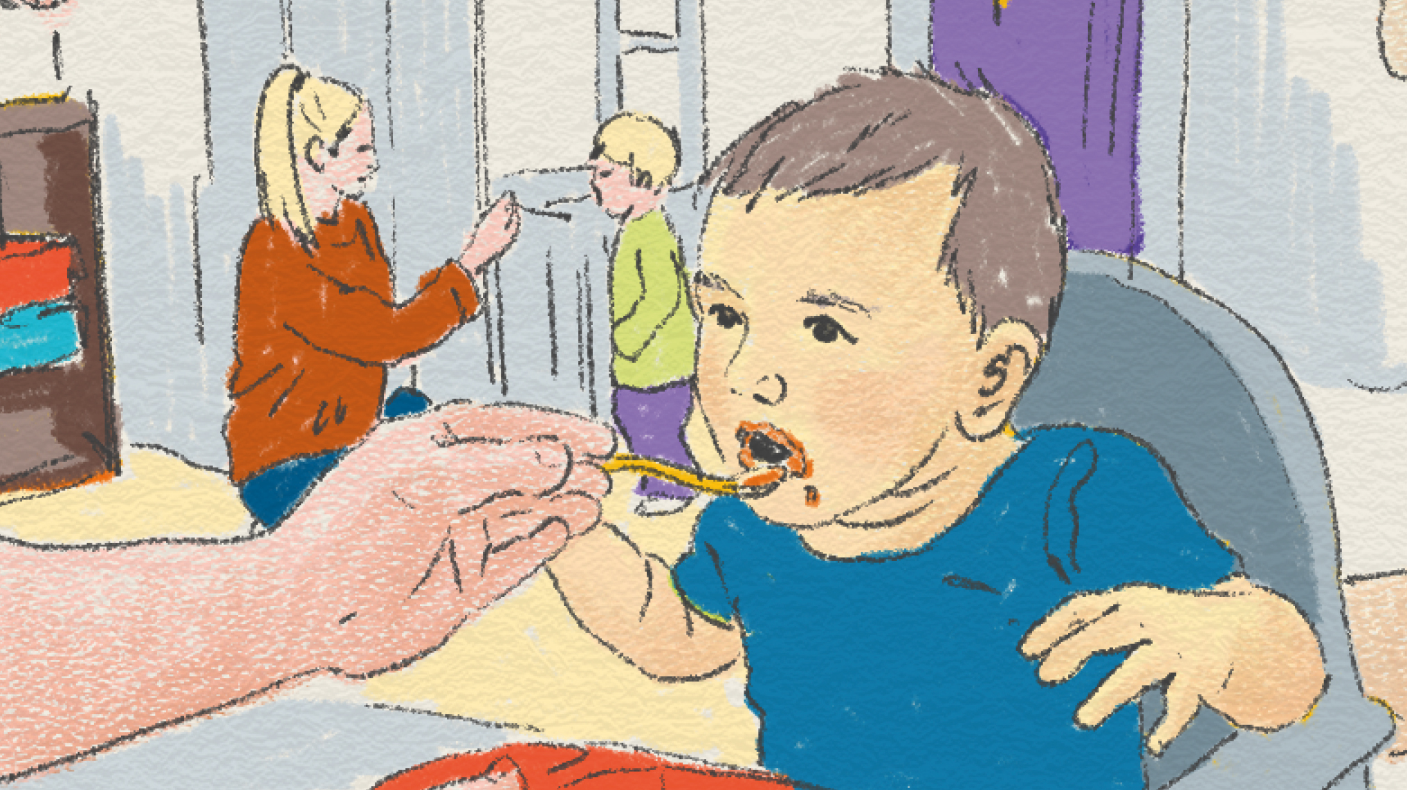 Ett litet barn blir mata