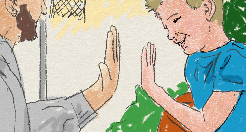 Två personer gör high five