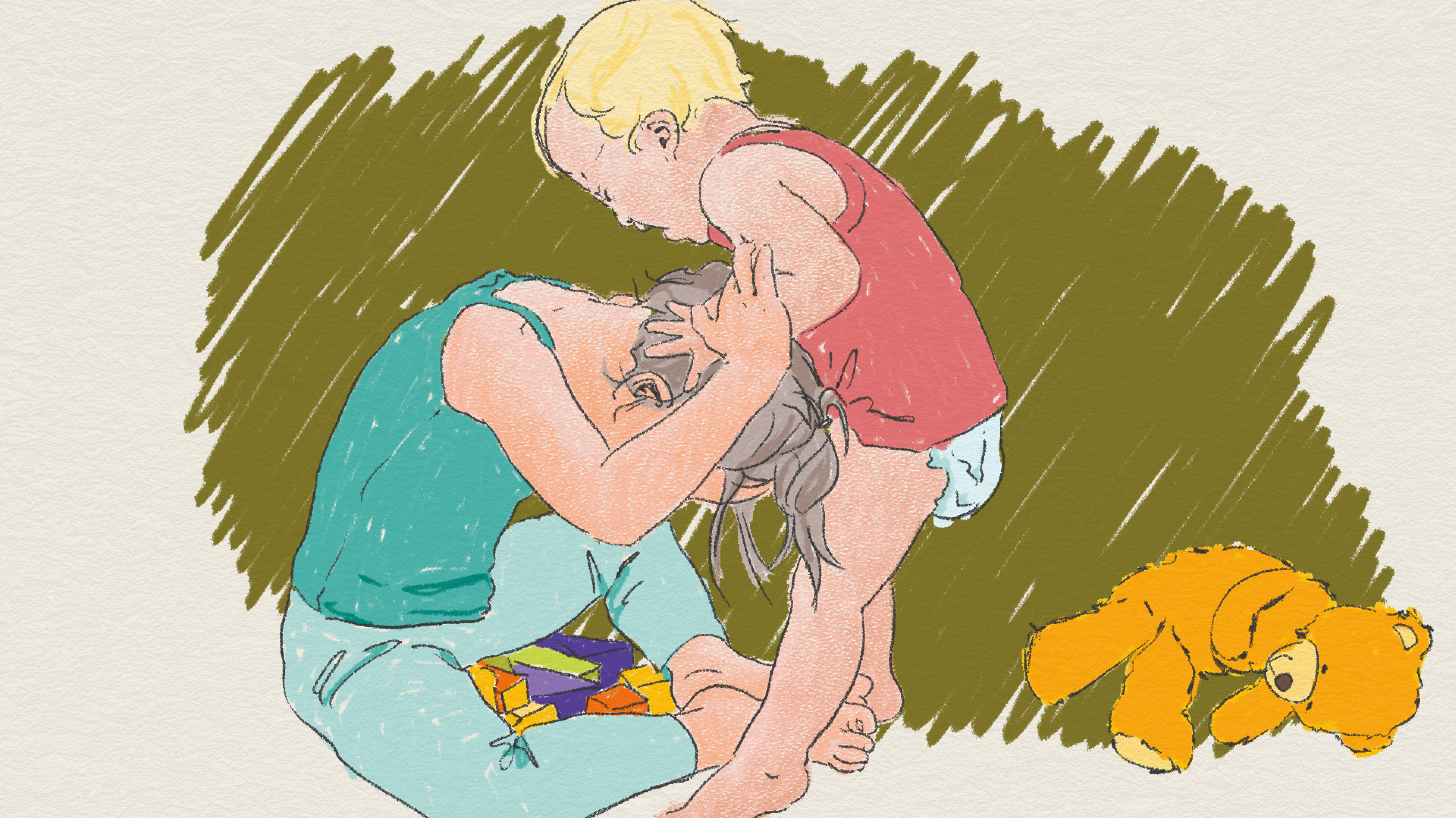 Två mindre barn som leker intill en nallebjörn