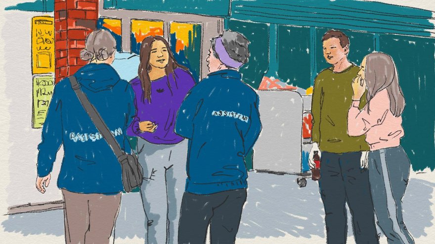 Personer står utanför en butik