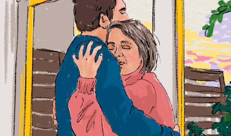 Två personer omfamnar varandra