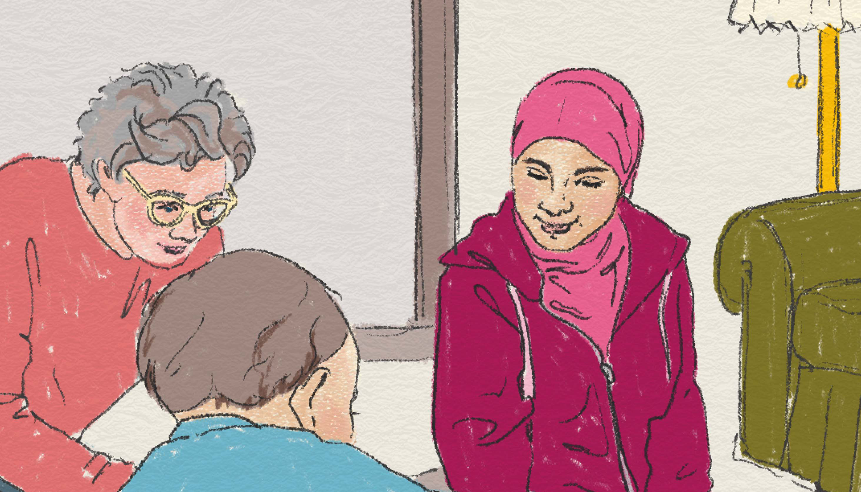 Två personer tittar på ett barn som leker på golvet