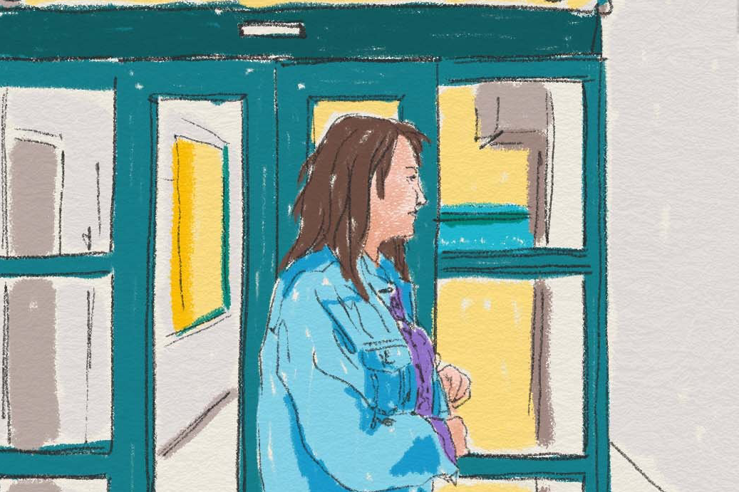 Person i sjukhuskorridor